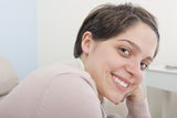 Happy smiling young adult  latina woman Royalty Free Stock Photos