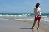 Woman at the beach Stock Photo