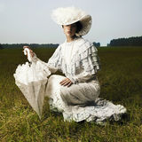 Woman in vintage dress Stock Photos