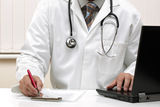 Writing a prescription medical examination notes Royalty Free Stock Photography