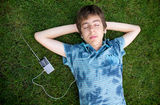 Male teenager listening to music  Stock Photography