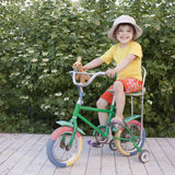 Girlie in grandmother's hat Royalty Free Stock Image