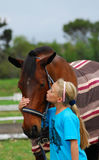 Girl and her horse Royalty Free Stock Photography