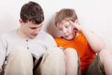 Two boys sit and read Royalty Free Stock Photo