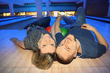 Youth and girl lie on back Stock Photography