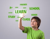 Kid touching LEARN button Stock Image