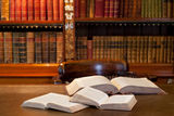 Open books in study or library Stock Photo