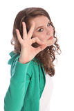 Okay hand sign success by smiling teenager girl Stock Photography