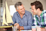 Adult father and son model making Stock Photography