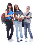 Happy teenage ethnic student girls in education Stock Photos
