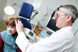 Medical otitus examination of child doctor Royalty Free Stock Photo