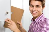 Student by school locker Royalty Free Stock Photos