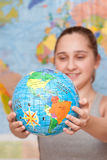Student with globe Stock Photo