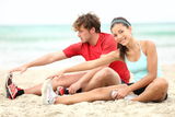 Couple training on beach Stock Photo