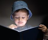 Boy read book Stock Photos