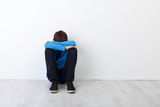 Sad teenager boy Stock Photo