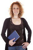 Attractive young student with textbook Royalty Free Stock Photos