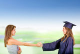 Education handshake Stock Photo