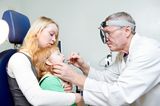 Medical otitus examination of child Royalty Free Stock Image