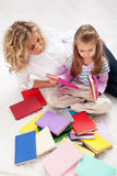 Selecting a story to read Royalty Free Stock Photo
