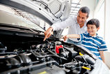 Father teaching car mechanics Stock Photos