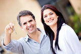 Couple with a key Royalty Free Stock Image