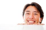 Man looking over a table Stock Photography