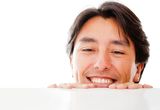 Man looking over a table Royalty Free Stock Image
