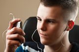 Teenager  with Music Player Stock Photos