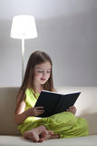 Girl read book Stock Photography
