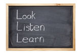 Blackboard with words Look Listen Learn Royalty Free Stock Photos