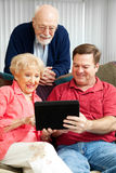 Tablet PC - Teaching Senior Parents Royalty Free Stock Photography