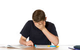 Teenager overwhelmed by his studies Royalty Free Stock Photos