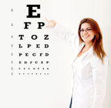 Friendly female optician Royalty Free Stock Photos