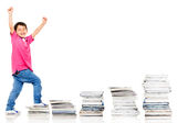 Happy boy climbing in his education Royalty Free Stock Images
