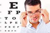 Man taking an eye exam Stock Photo