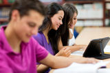 Students reading on an e-book Stock Image