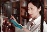 A miss staff is working Stock Photos
