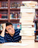 Overwhelmed male student Royalty Free Stock Photo