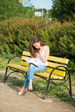 Woman read a magazin Stock Image