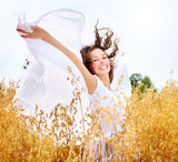Girl on the Wheat Field Royalty Free Stock Photography
