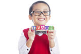 Schoolboy with LEARN word Stock Images