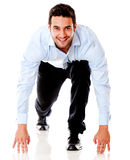 Businessman ready to run Royalty Free Stock Image