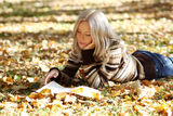 Woman read in park Stock Photo