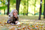 Woman read in park Stock Images