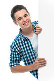 Teenager holds a blank board Stock Photography