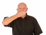 Man with hand over mouth Stock Images
