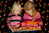 Two girls read book Royalty Free Stock Photo