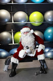 Santa Claus training before Christmas Stock Photo