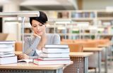 Beautiful student studies Stock Photo